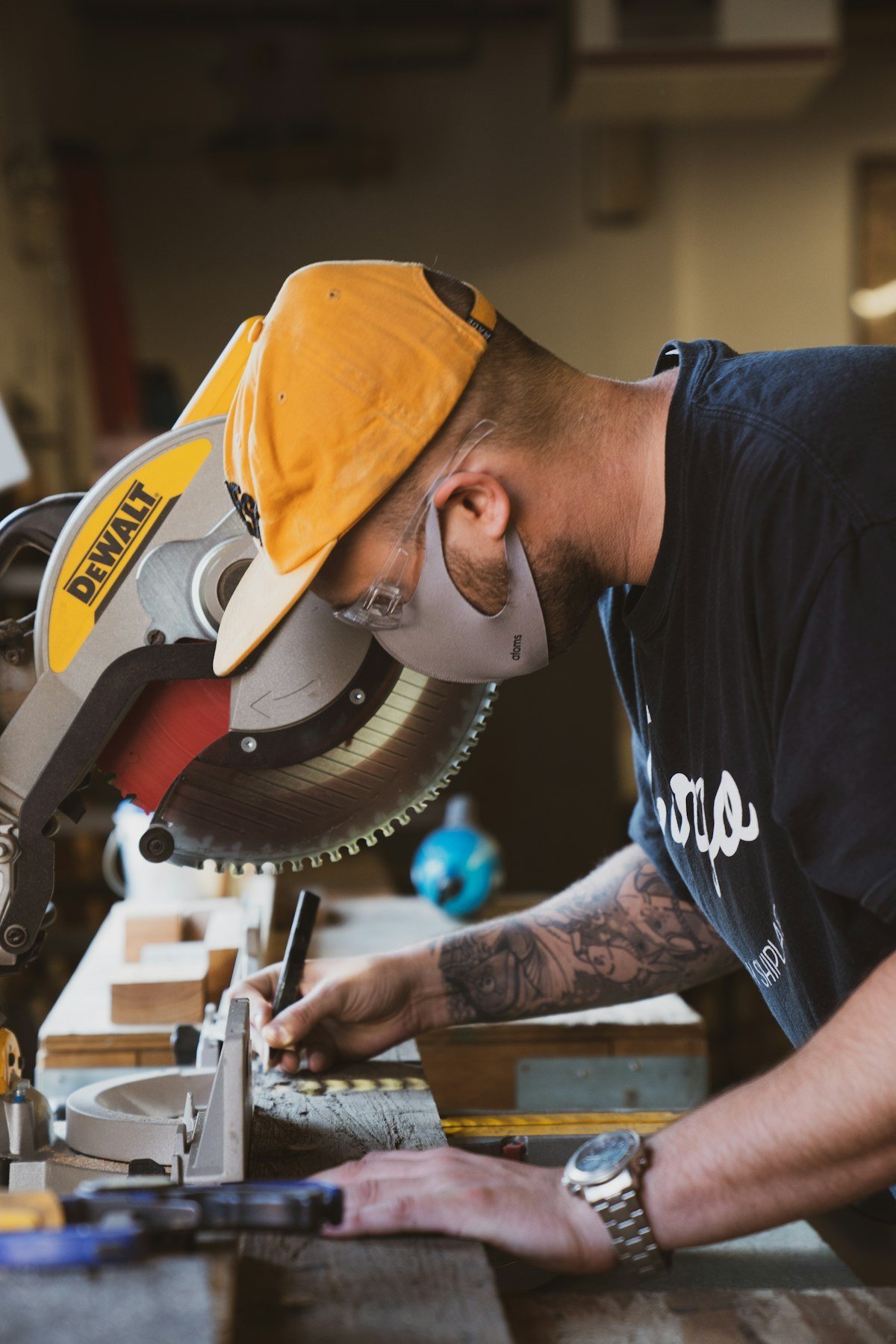 Tradesperson cutting timber accurately for building work